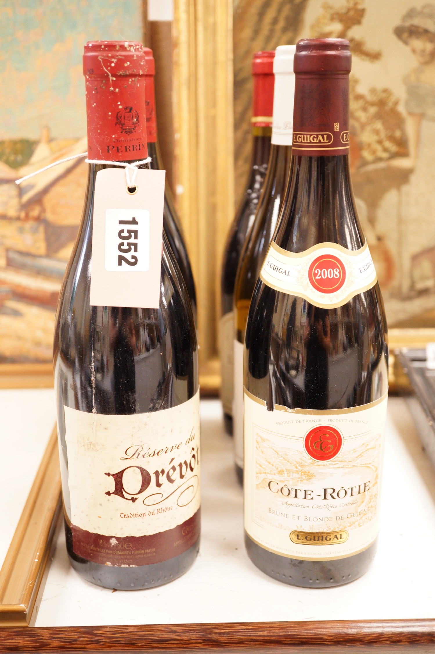 A group of 6 various bottles of wine